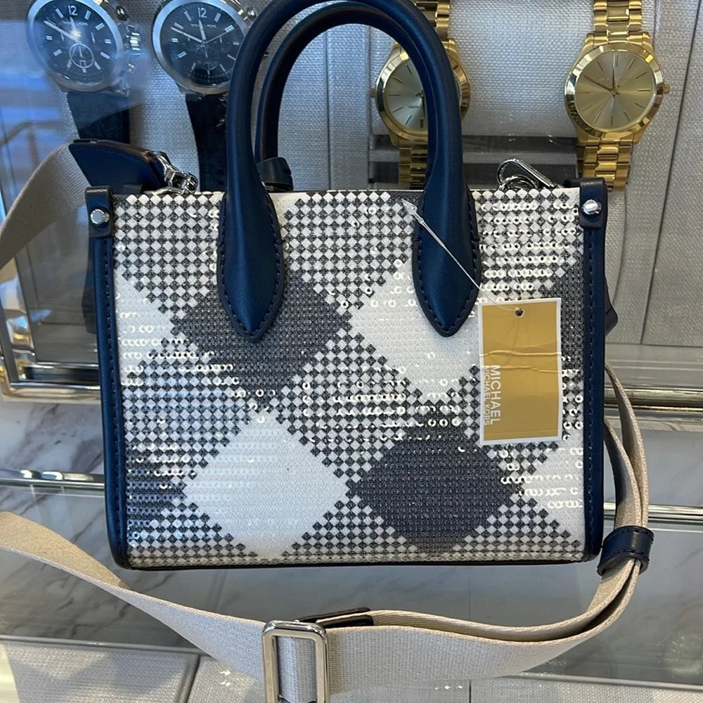 Michael Kors Mirella Extra-Small Logo Crossbody XBODY Shopper Bag
Navy
NWT
L - Picture 16 of 16